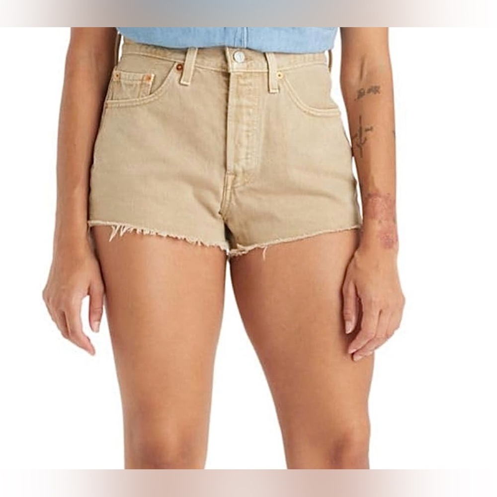 Tan pair of denim Levi shorts